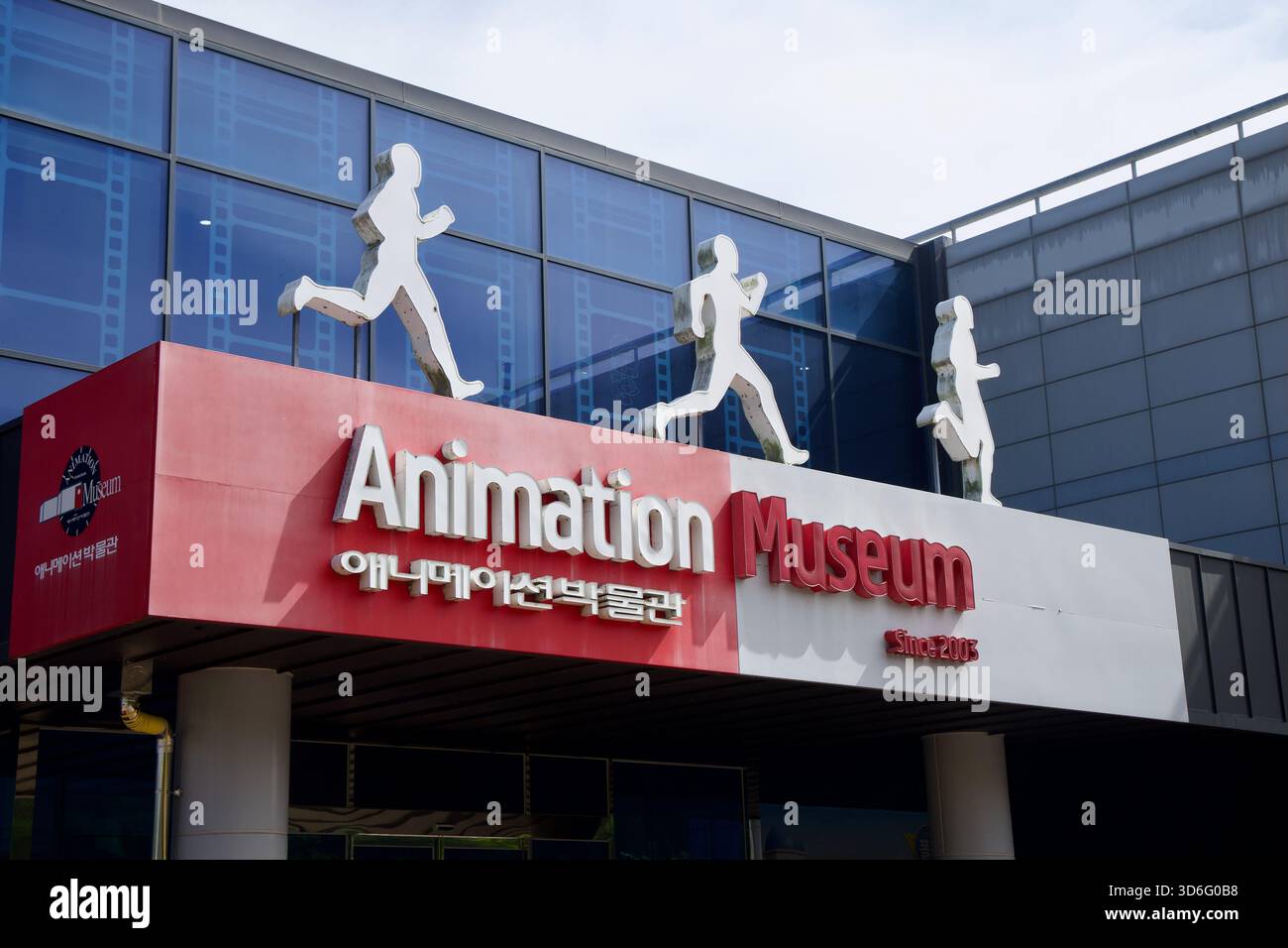 A close view of the Animation Museum entrance sign shows the red and ...