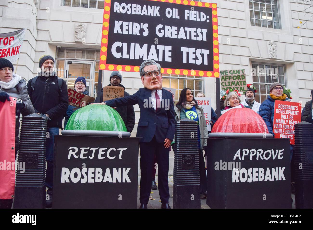 Jake Rigg Desnz London, UK. 20th November 2025. A protester wearing a Keir Starmer mask ...