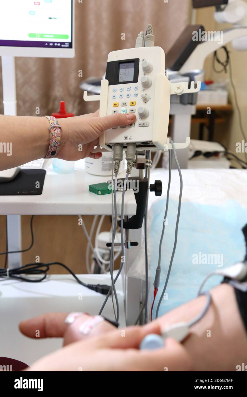 Examples Electromyography Electromyography. A man undergoes an examination on an electromyograph ...