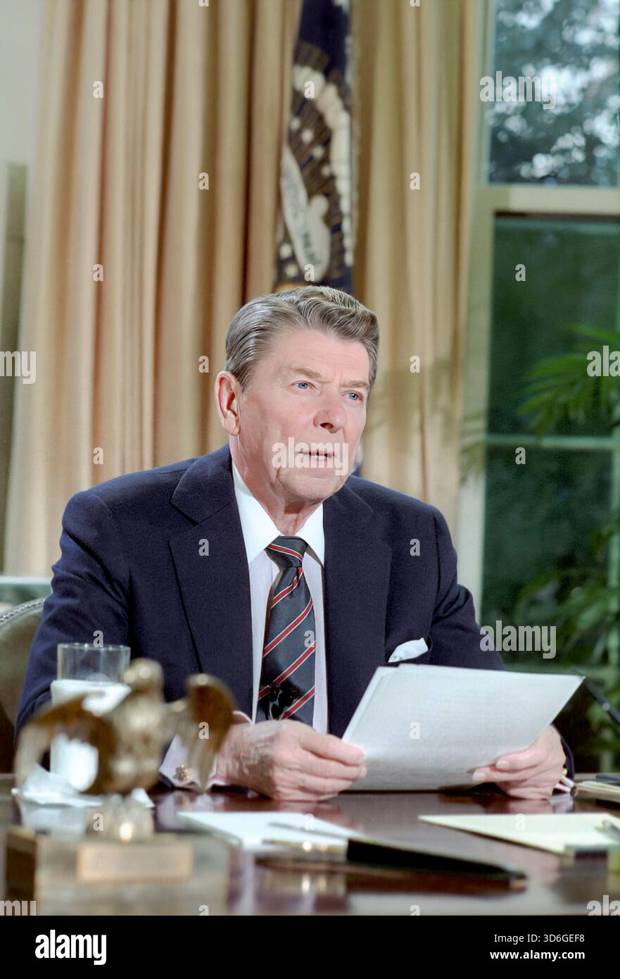 U.S. President Ronald Reagan speaking to the nation on the space ...