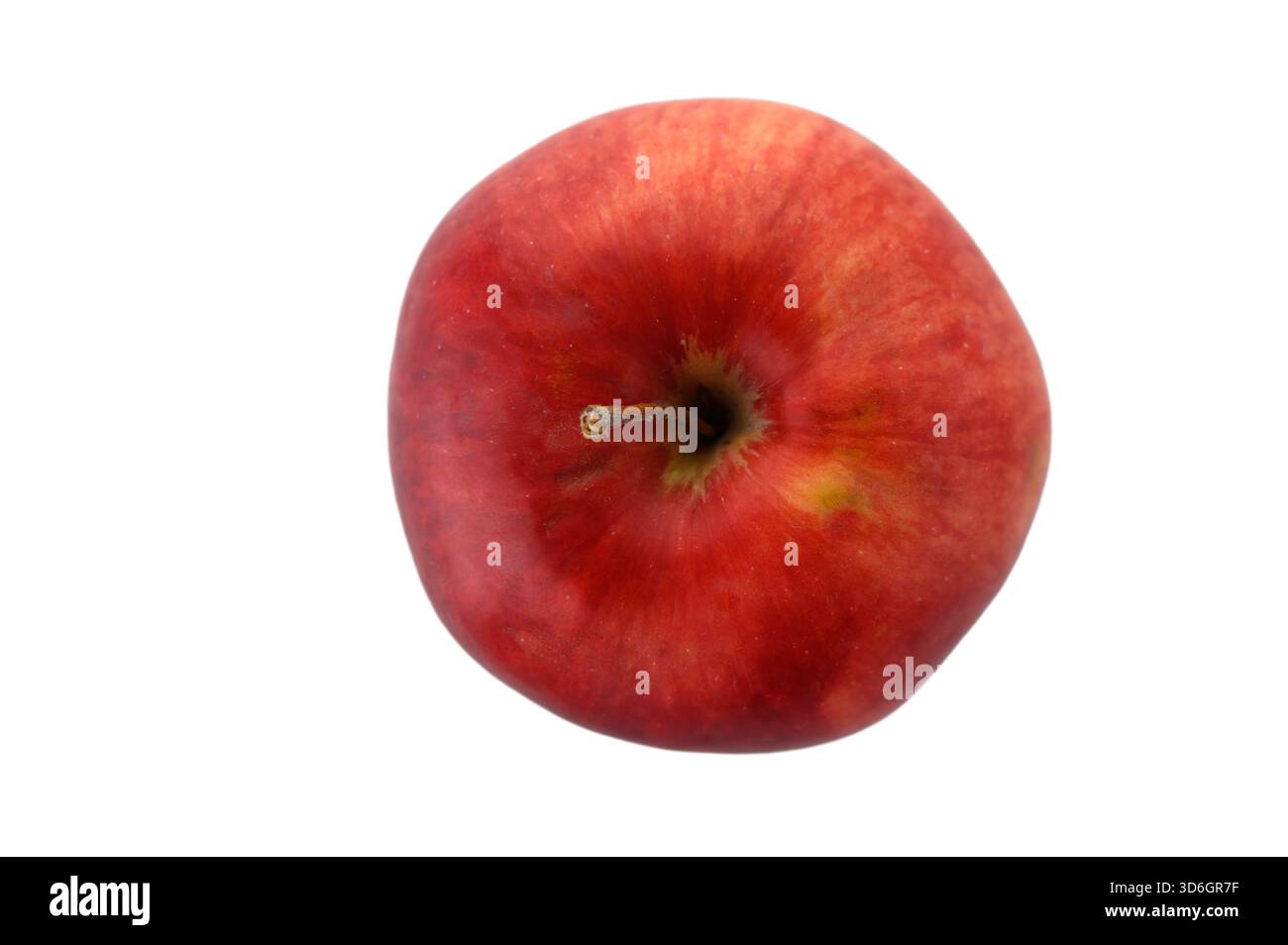 Fresh red apple photographed from above on clean white background ...