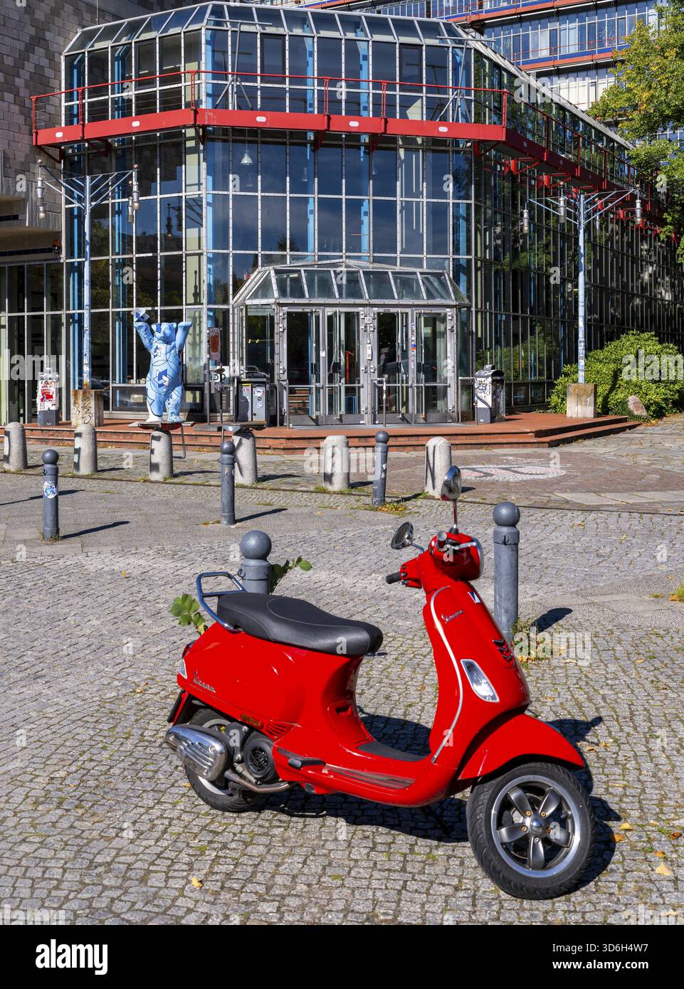 Red Vespa parked in front of the entrance to the Einstein Center for ...