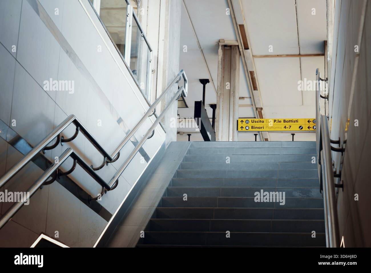 Public staircase at train station boarding platform for exit, entrance ...