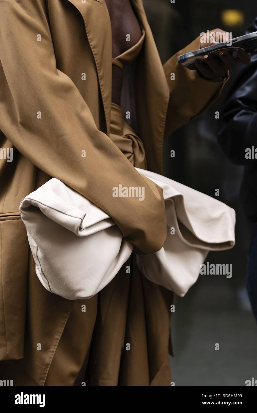 Female wearing beige top hi-res stock photography and images - Alamy