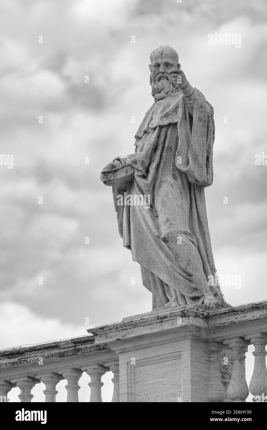 Saint Benedict of Nursia atop the North Colonnade of St Peter’s Basilica. Stock Photo