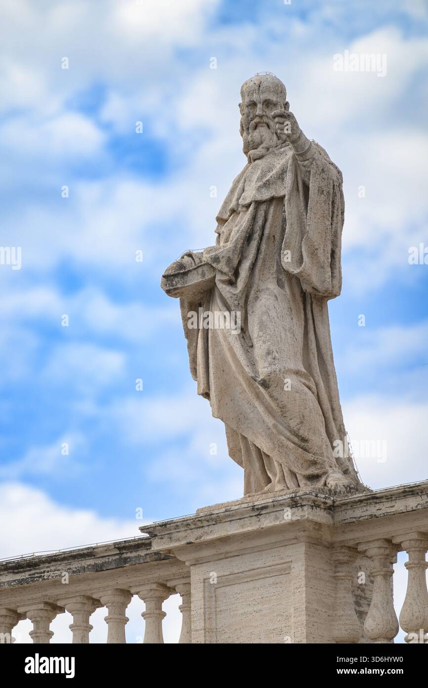 Saint Benedict of Nursia atop the North Colonnade of St Peter’s Basilica. Stock Photo