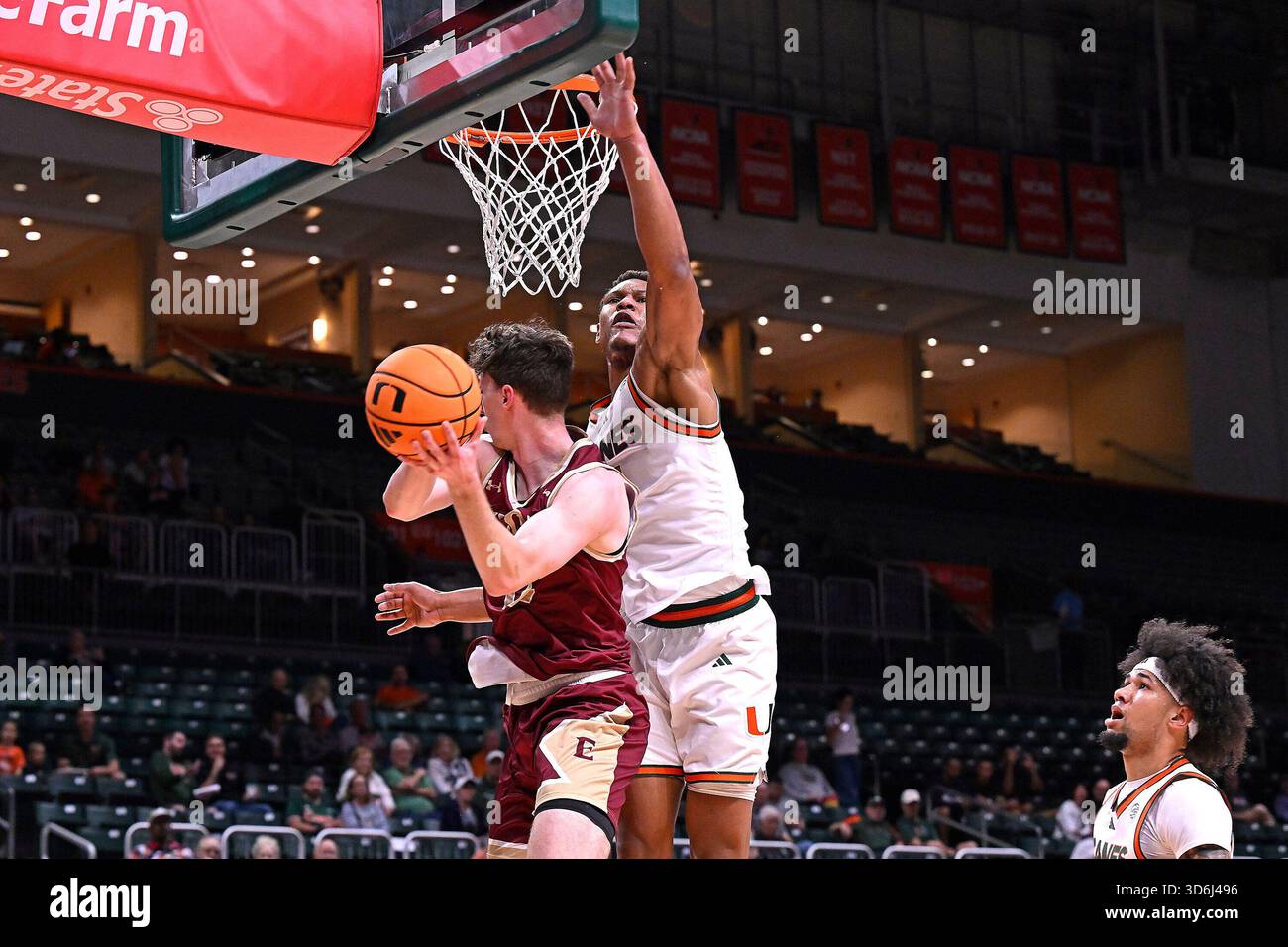CORAL GABLES, FL - NOVEMBER 20: Miami forward Malik Reneau (5) prevents ...
