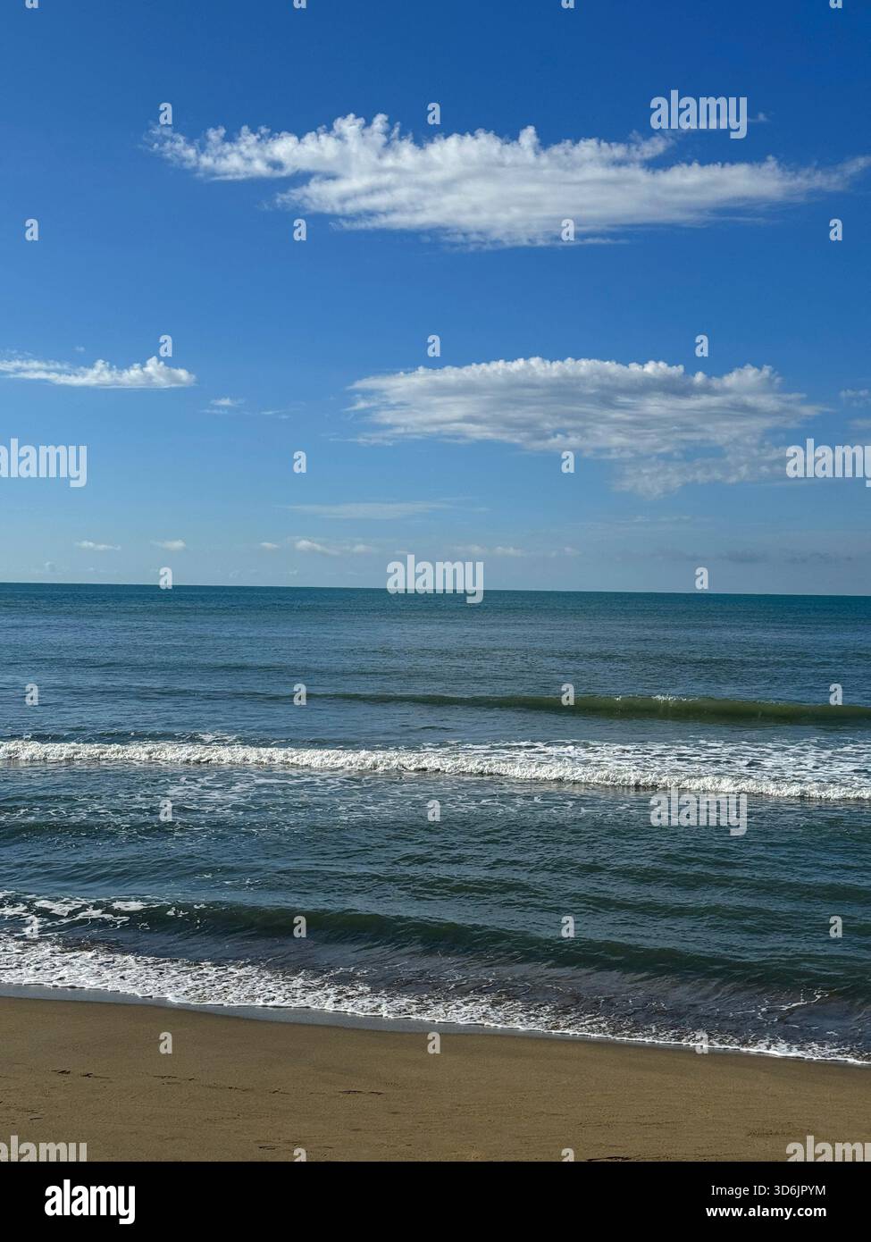Sandy beach blue sky clouds hi-res stock photography and images - Alamy