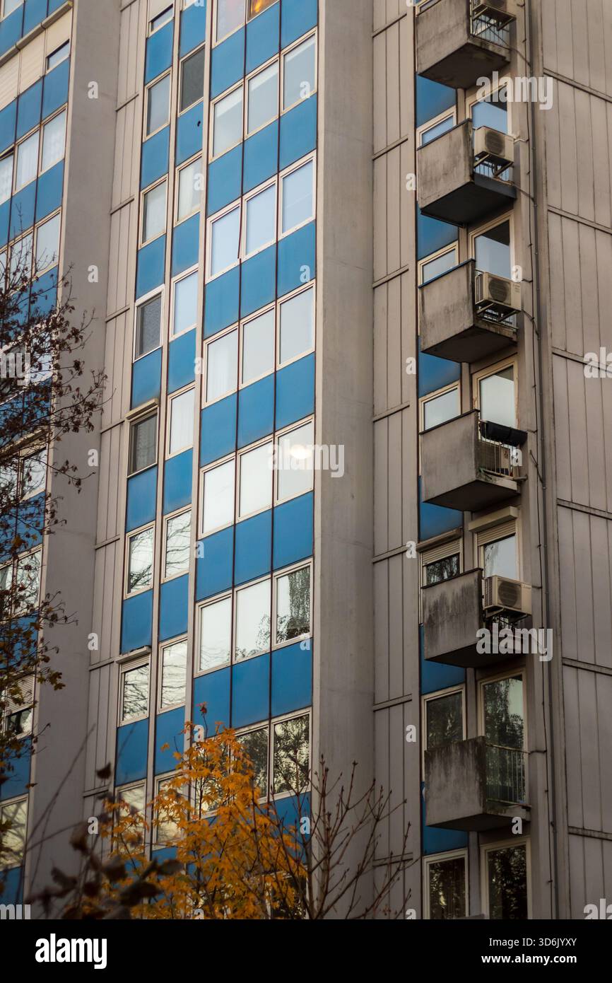 high-rise building facade with blue panels and balconies Stock Photo ...