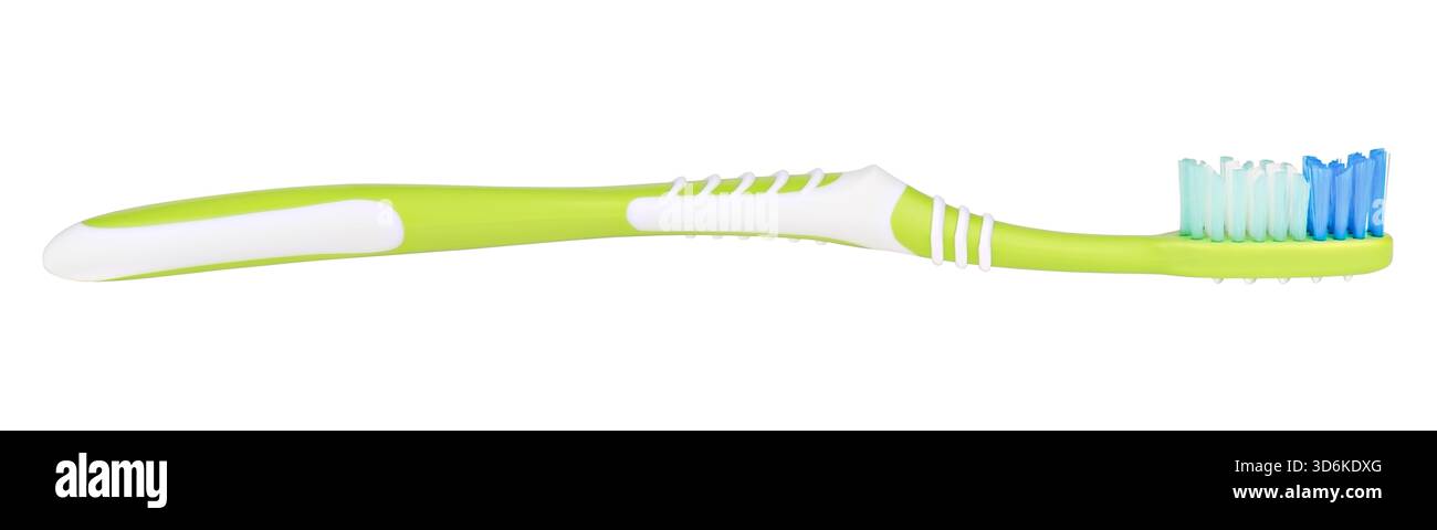 green toothbrush isolated on white background. Stock Photo