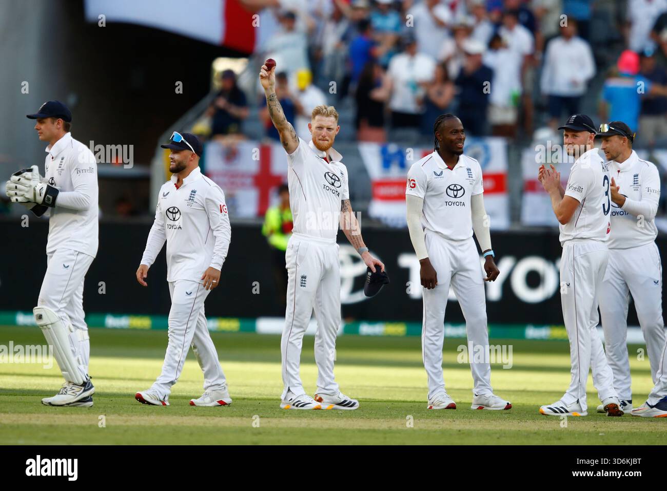 england-s-captain-ben-stokes-center-raises-the-ball-after-taking-five