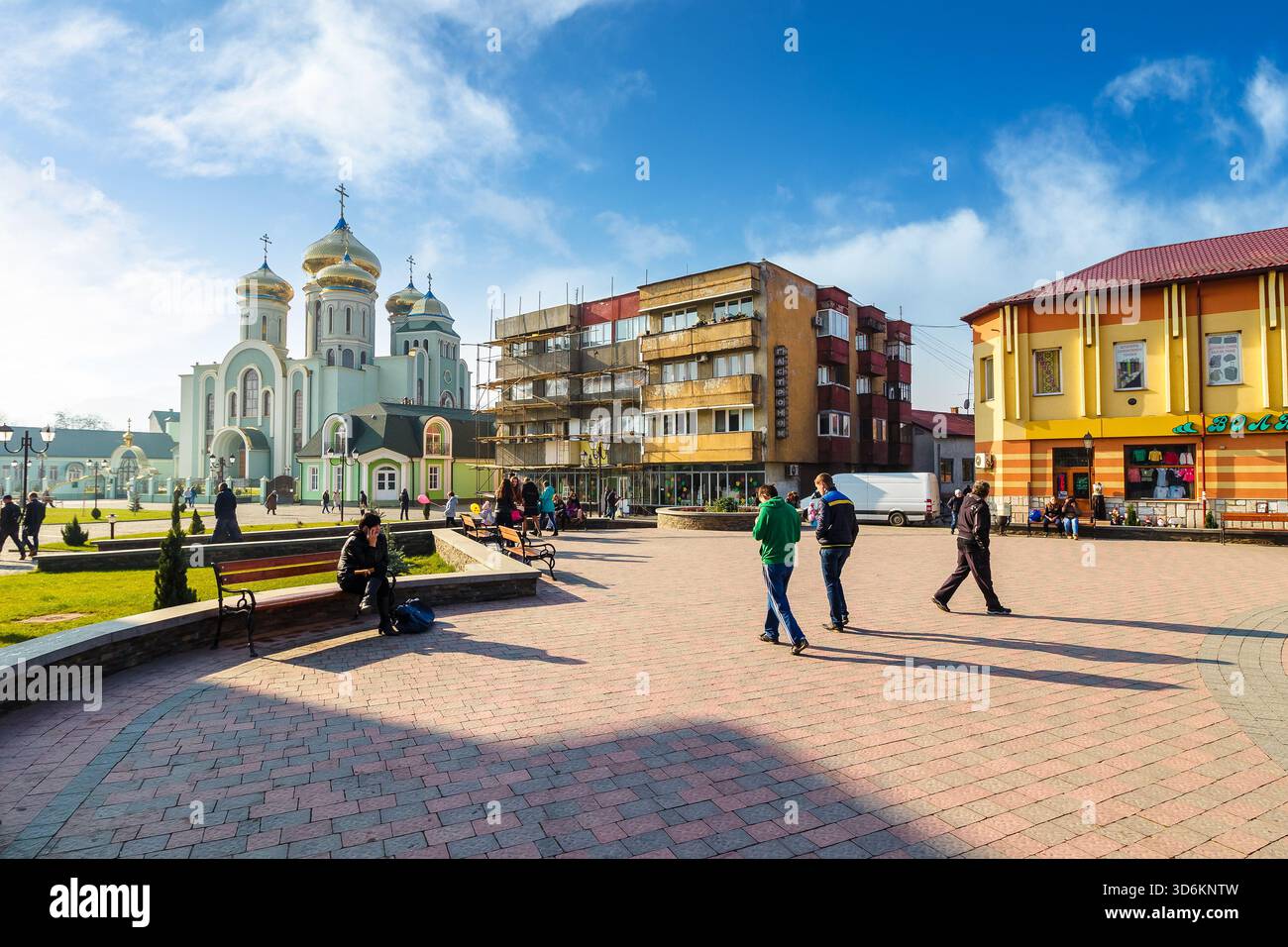 khust, ukraine - 06 nov 2015: old city downtown in autumn. cathedral on the central square of independence on a sunny weather. travel destination of t Stock Photo