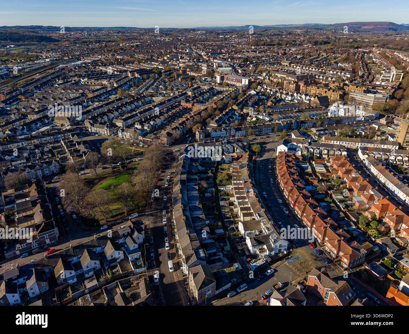 Aerial drone view of residential housing and streets in Cardiff, Wales on a sunny winter day Stock Photo