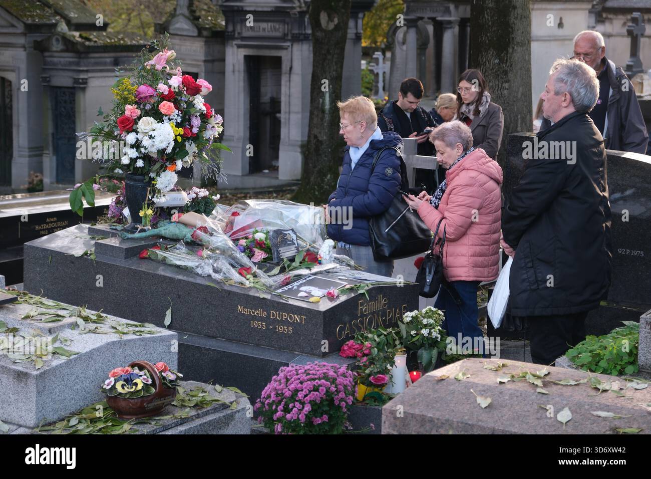 Edith Cemetery Tourists visit the grave of Edith Piaf French Singer/songwriter and ...