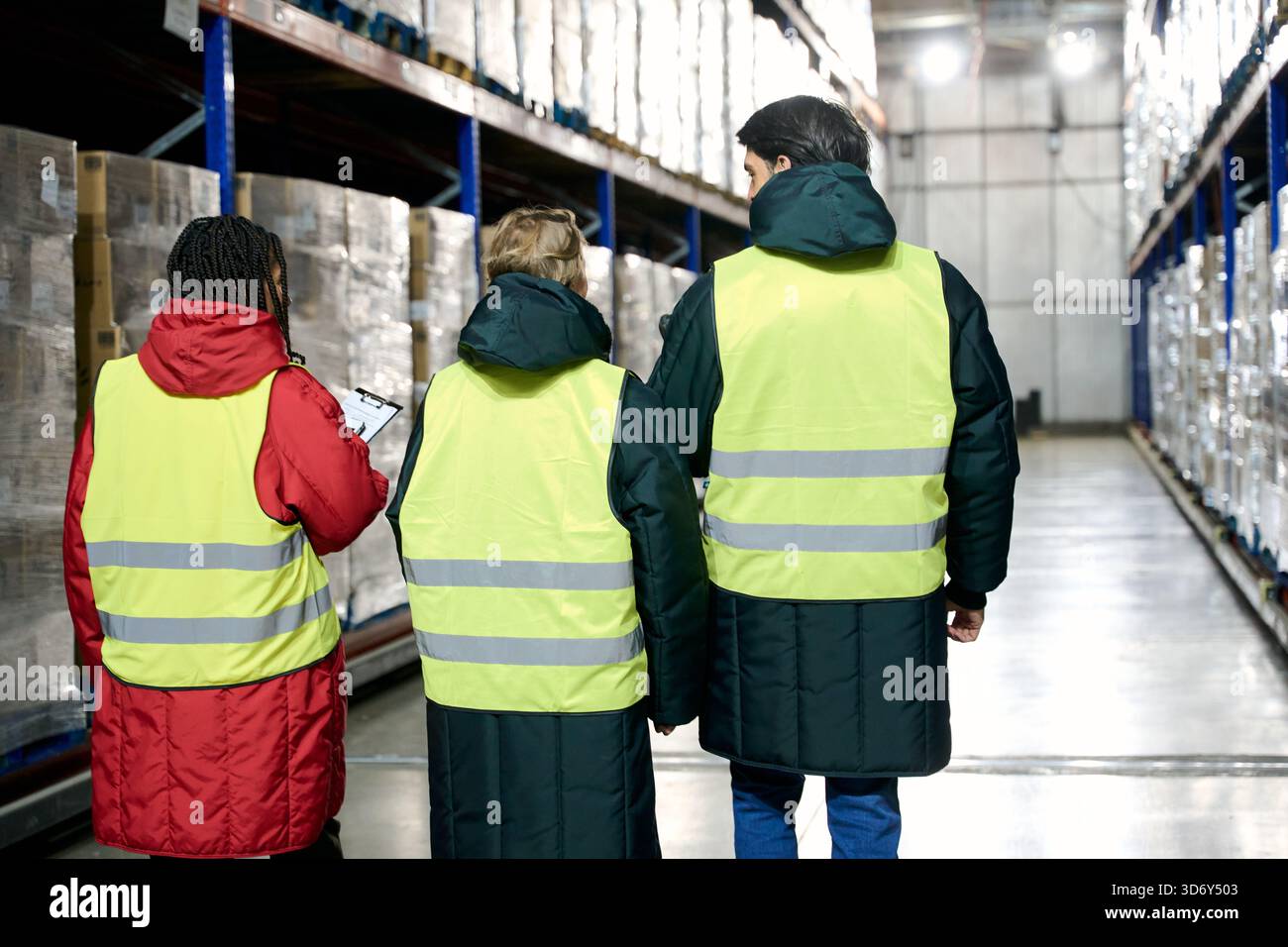 Warehouse workers checking inventory in cold storage chain Stock Photo