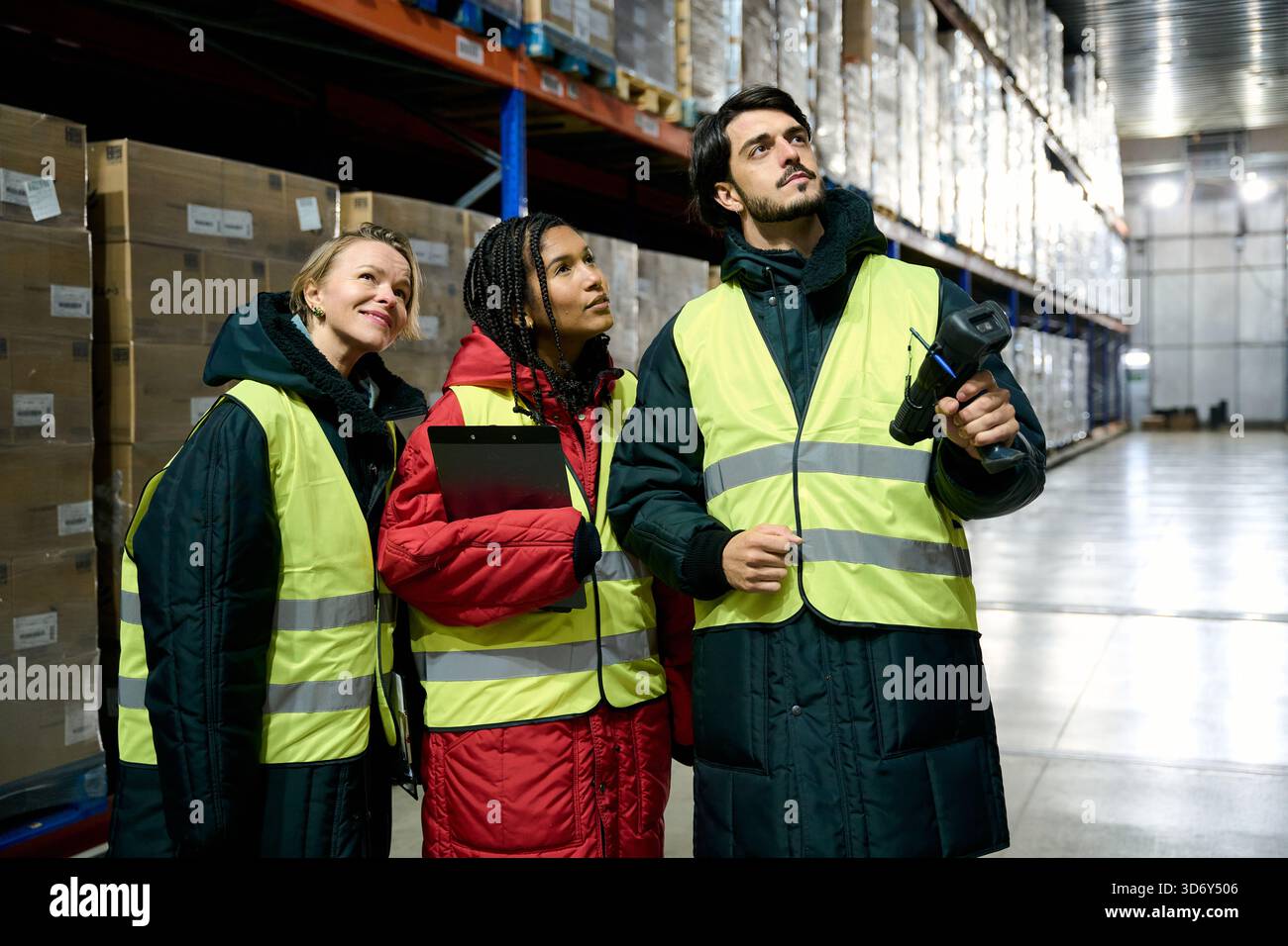 Warehouse workers controlling inventory in cold chain storage Stock Photo