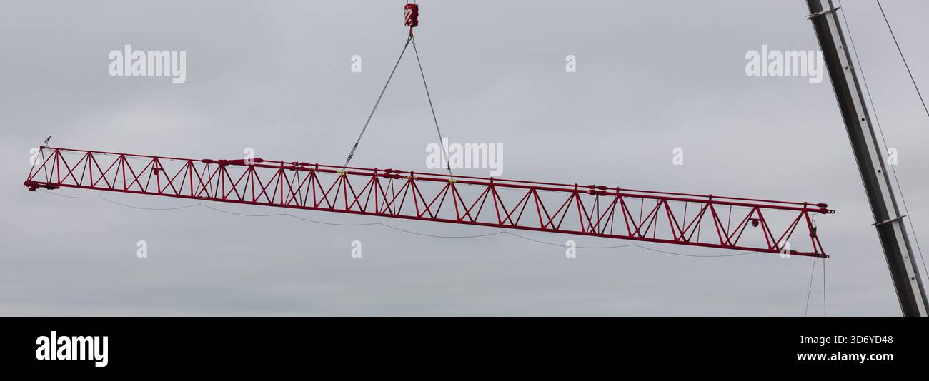 Highrise crane being built. Stock Photo