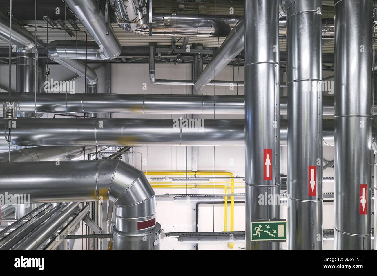 Heat and cooling pipe system in a heating plant. Stock Photo