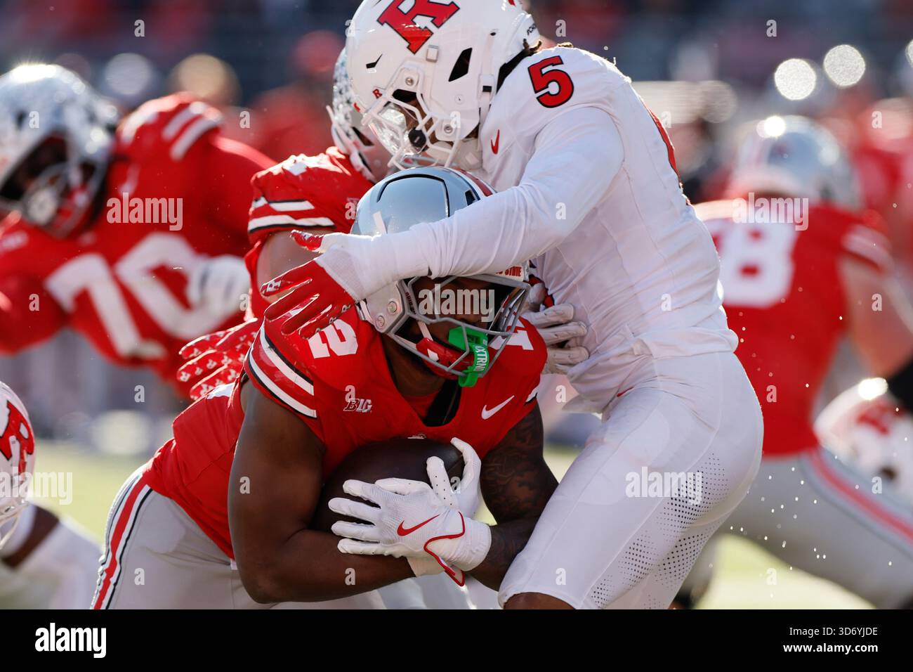 Brandon Sanders Rutgers Rutgers defensive back Kaj Sanders, right, tackles Ohio State running ...