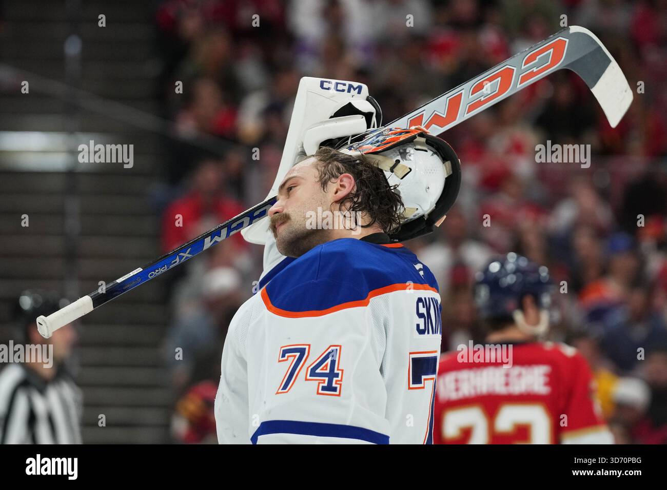Edmonton Oilers goaltender Stuart Skinner (74) adjust his helmet during ...