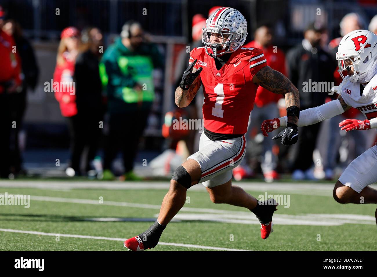 Ohio State receiver Brandon Inniss plays against Rutgers during an NCAA ...