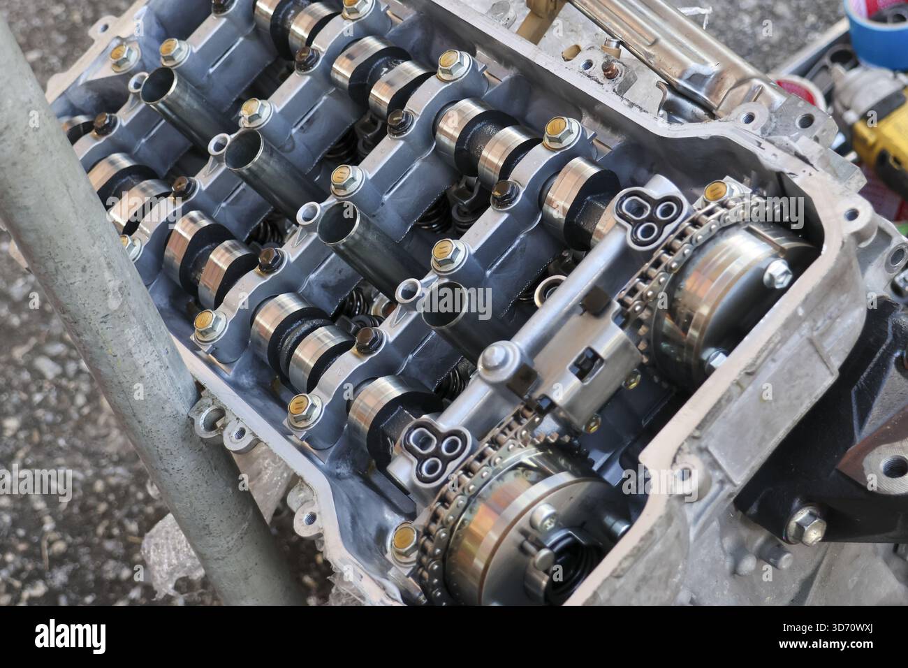 Close up view of car engine internal part with camshaft and timing ...