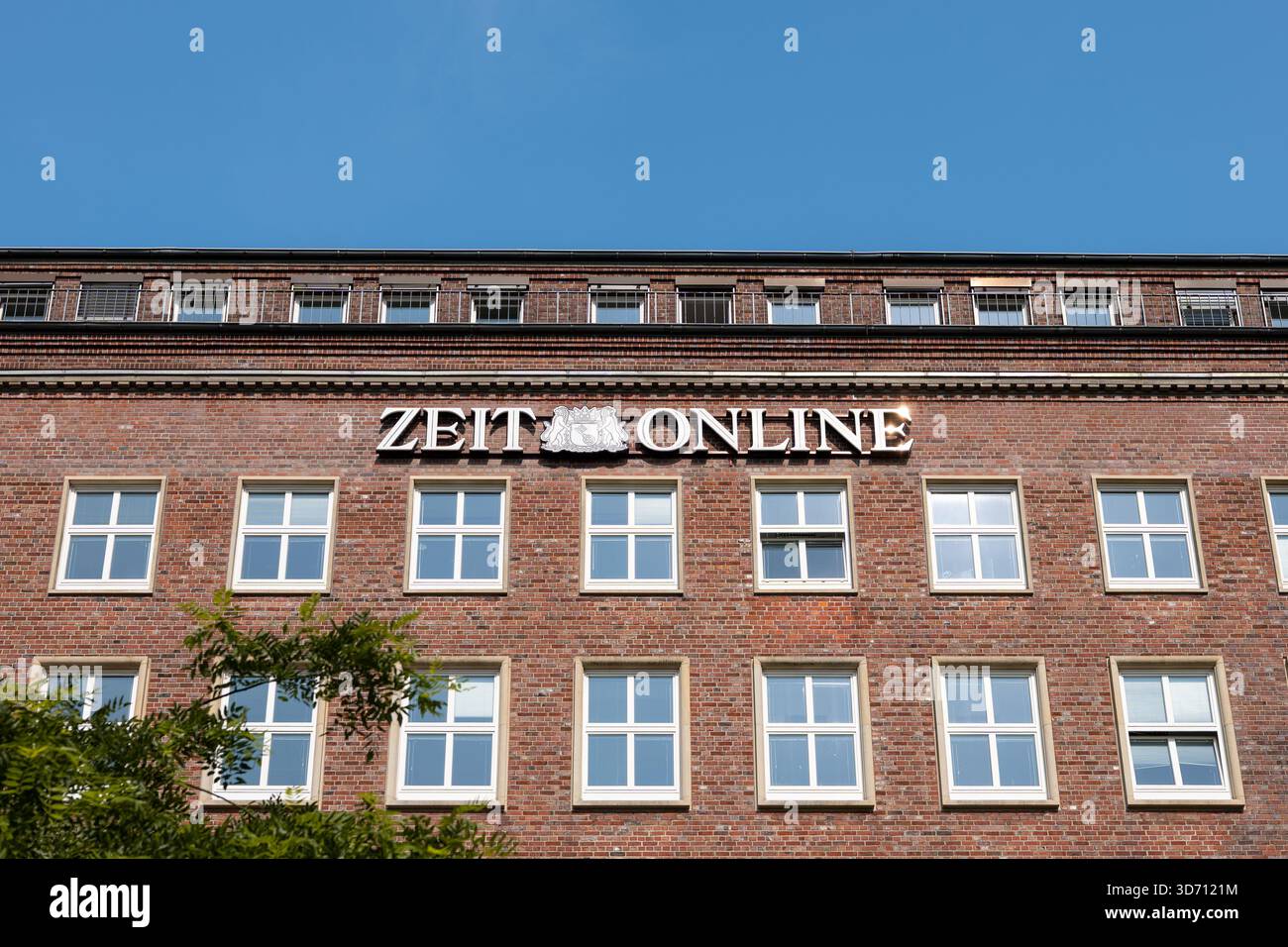 Zeit Online logo sign of the German weekly newspaper and publisher. The signage is at the facade of the Helmut-Schmidt-Haus building in Hamburg. Stock Photo