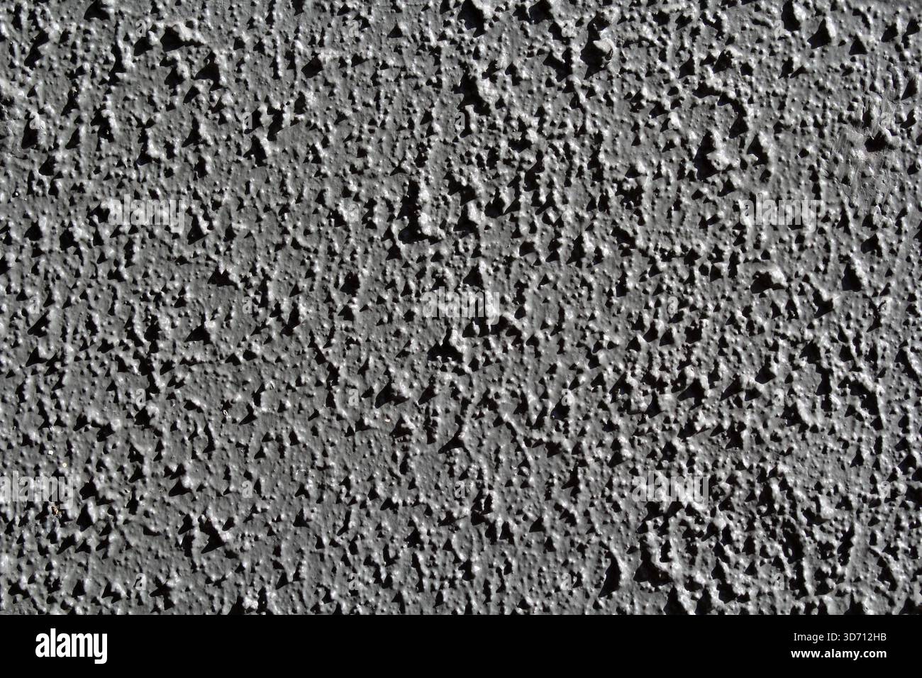 Grey gray textured concrete stucco wall abstract background Stock Photo
