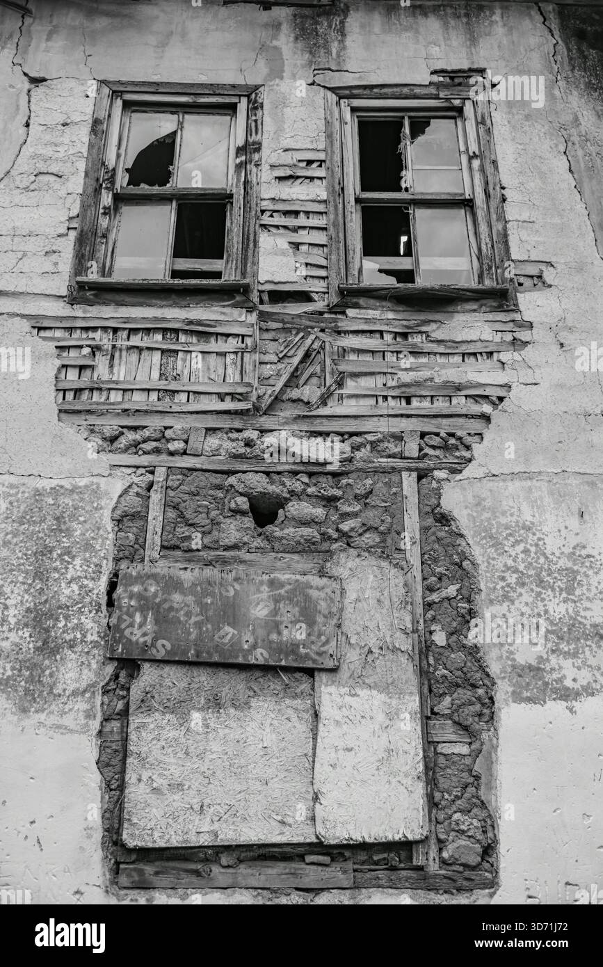 Symmetrical Arched Windows in a Stone Masonry Wall Stock Photo - Alamy