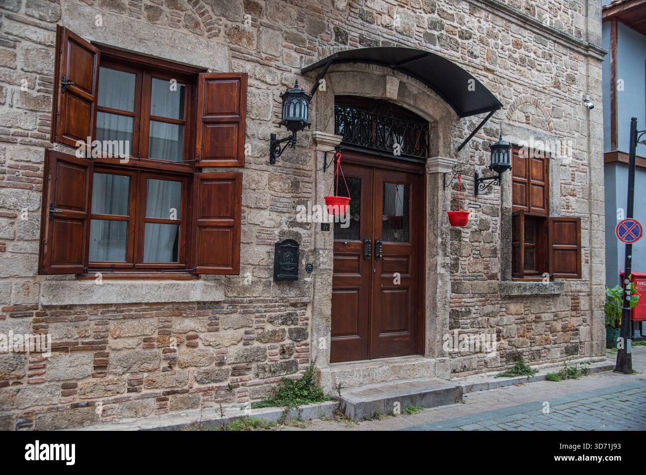 Symmetrical Arched Windows in a Stone Masonry Wall Stock Photo - Alamy