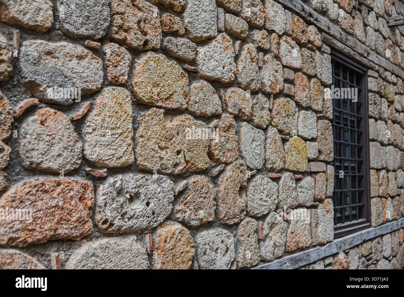 Symmetrical Arched Windows in a Stone Masonry Wall Stock Photo - Alamy