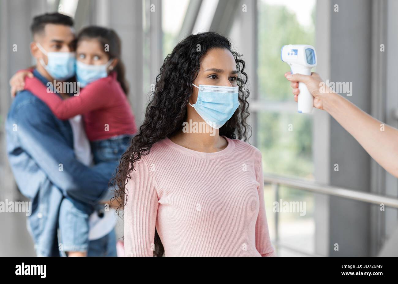 Family Health Checkup Family Participates in Health Check at Public Space With Masks and ...