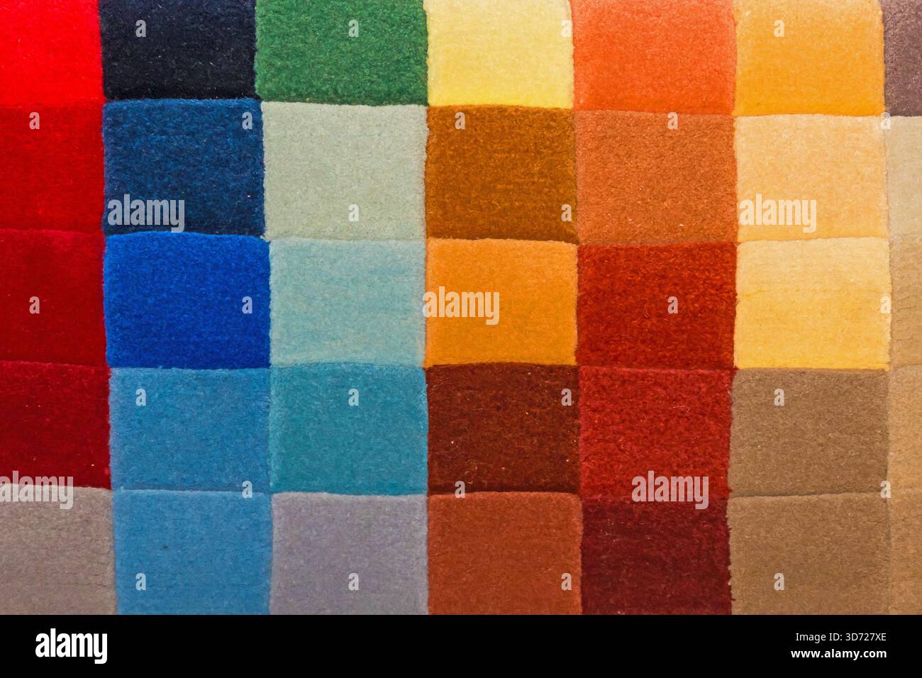Colorful squares pattern carpet material samples background Stock Photo