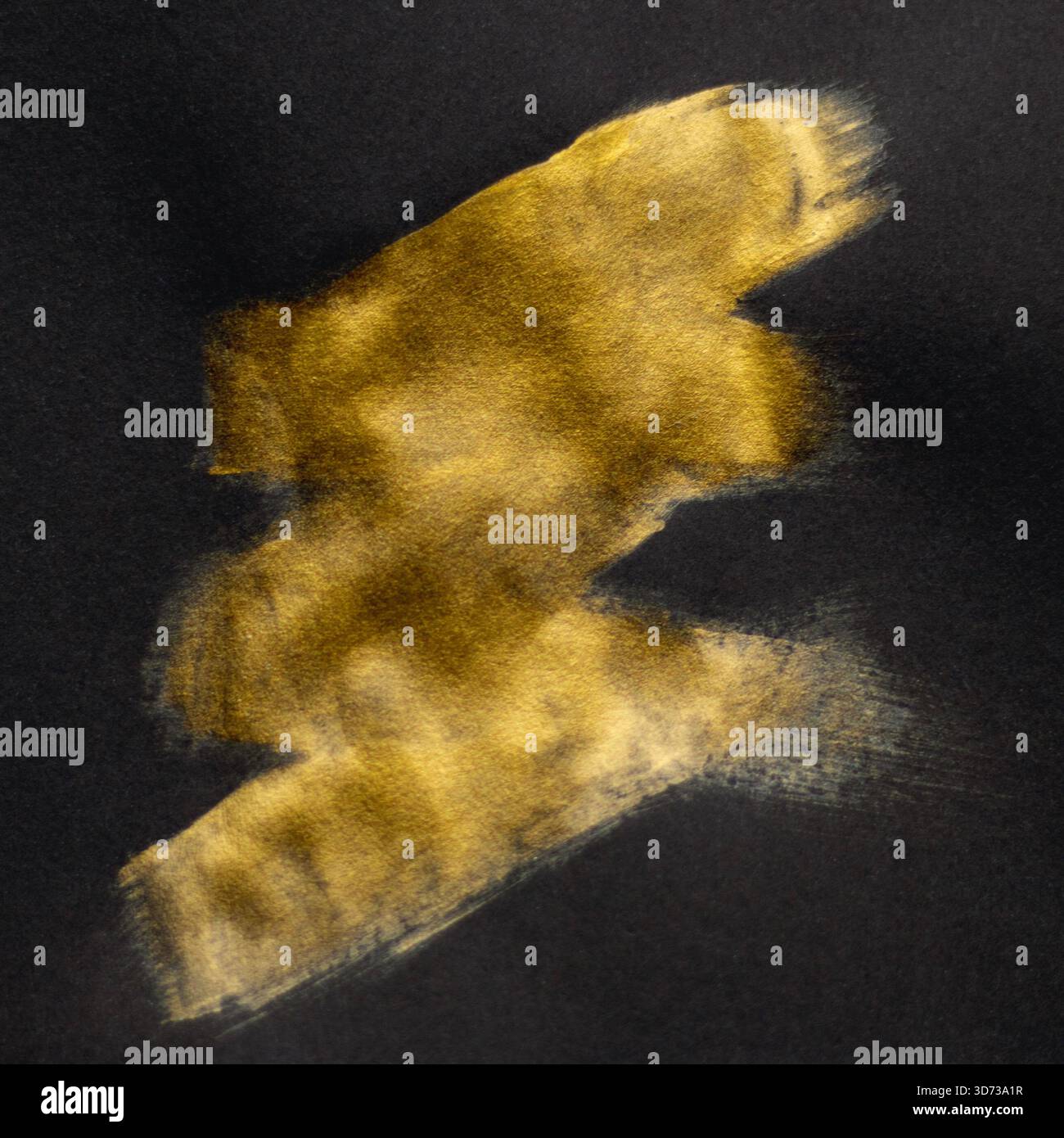 Abstract gold brush stroke on dark background for luxury art, texture, and decorative design Stock Photo