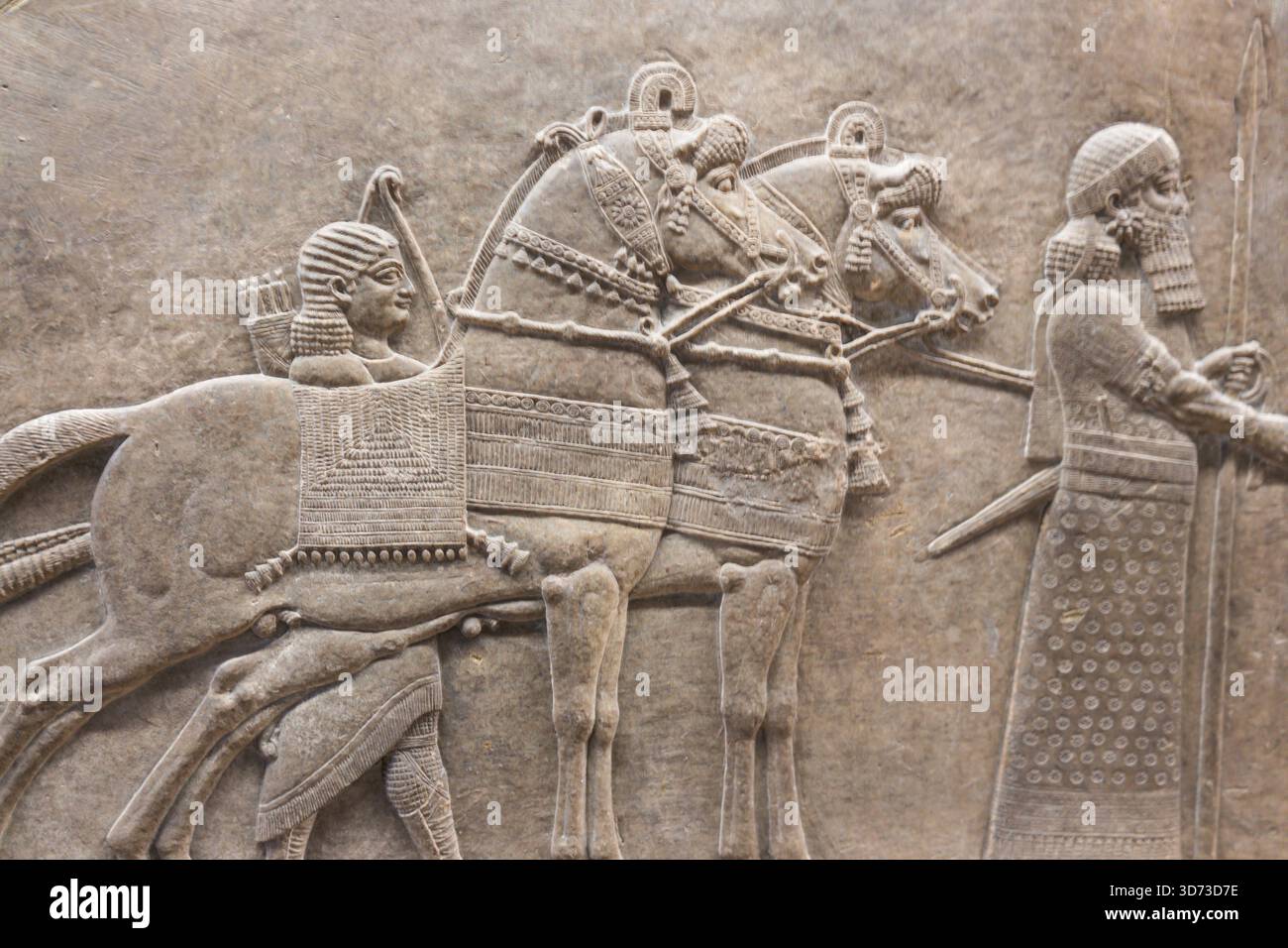 Ancient Assyrian Bas Relief Sculpture from British Museum. London, UK, 21 October 2023 Stock Photo