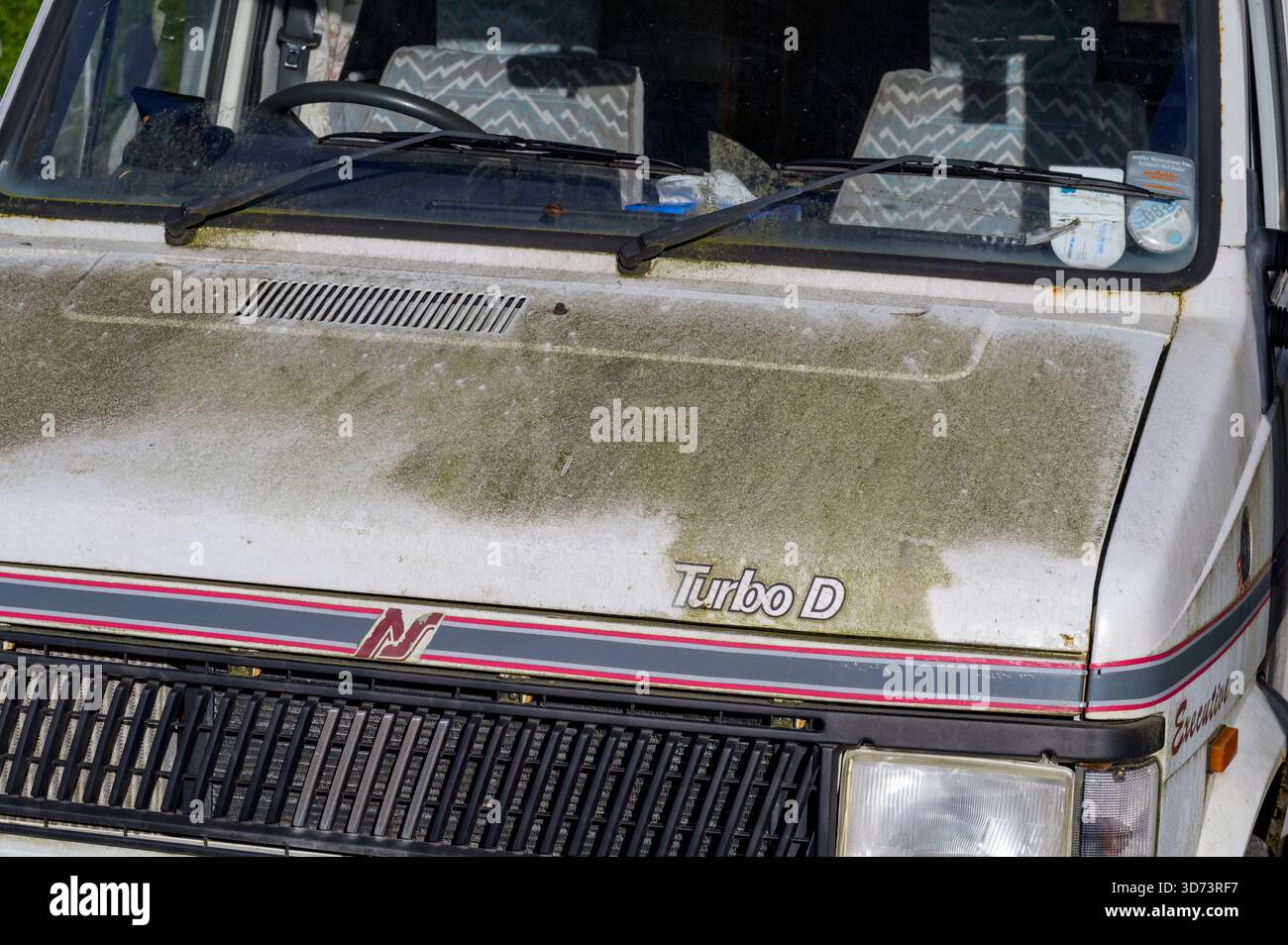 An old dirty bonnet on a vehicle, UK Stock Photo