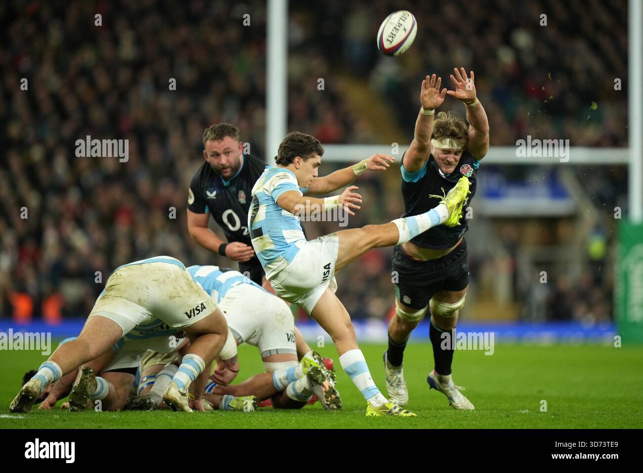 Argentina's Agustin Moyano clears from England's Alex Coles during the ...