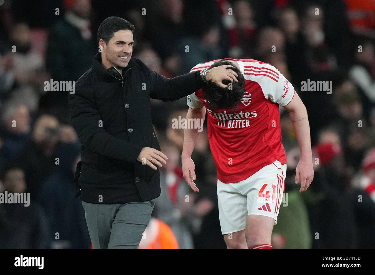 Arsenal's manager Mikel Arteta and Declan Rice walk off the pitch after ...