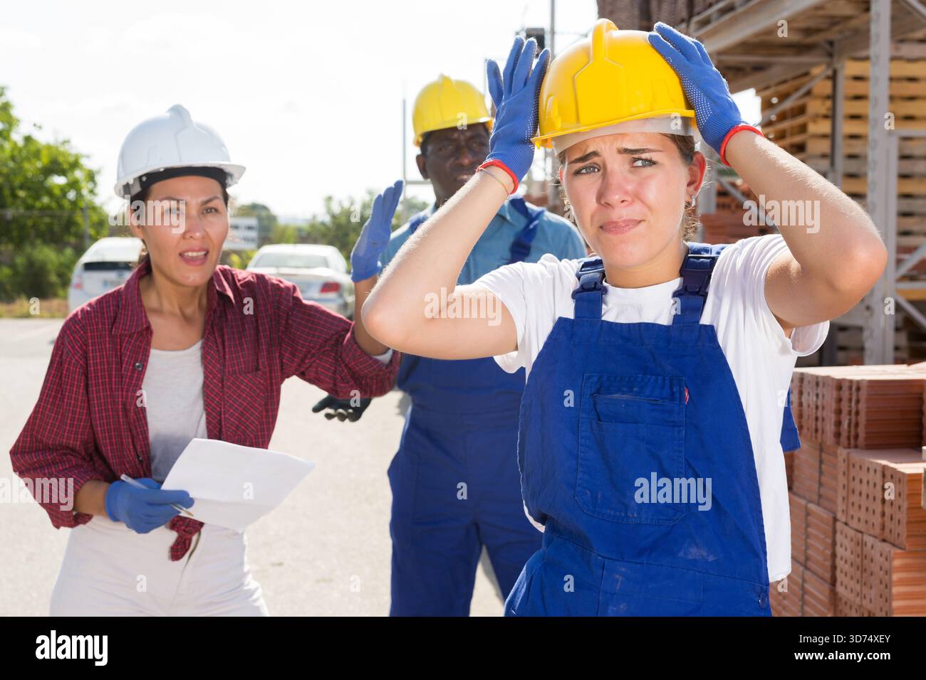 Workers have problems at work at a hardware store Stock Photo