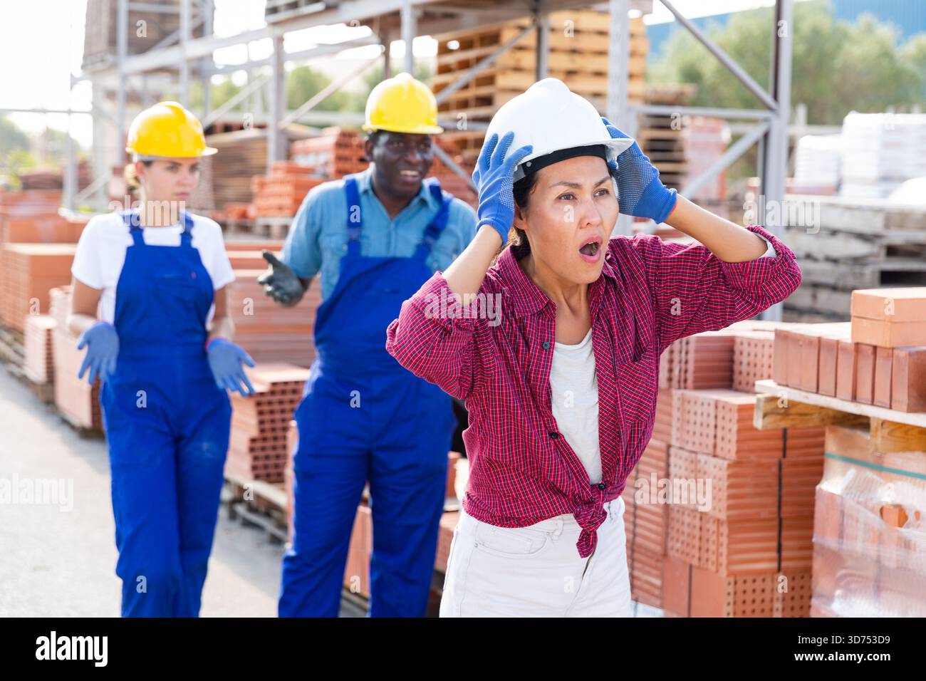 Workers have problems at work at a hardware store Stock Photo