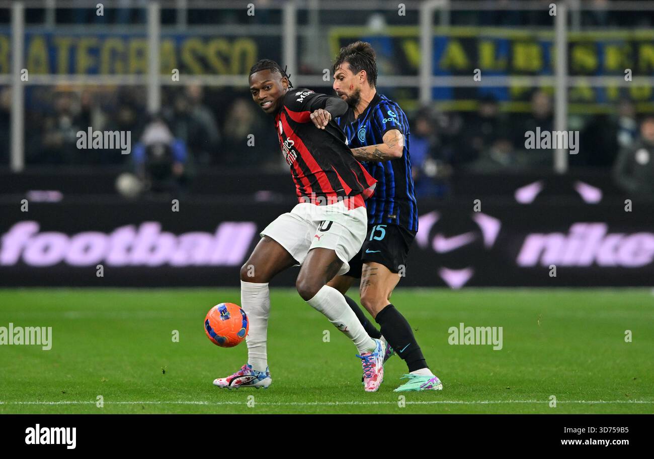 Rafael Leao of AC Milan challenged by Francesco Acerbi of FC ...