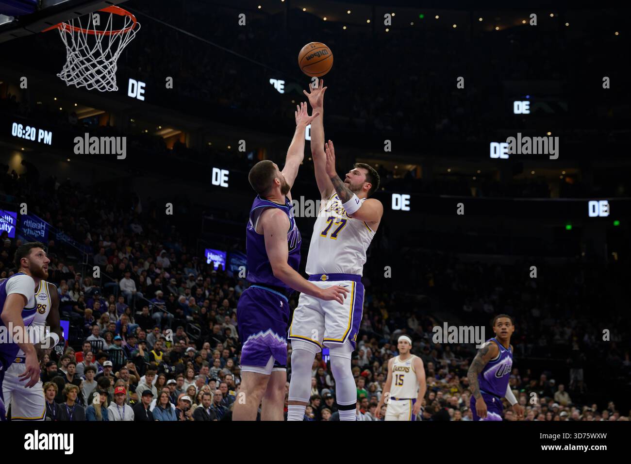 Los Angeles Lakers guard Luka Doncic (77) shoots the ball over Utah ...
