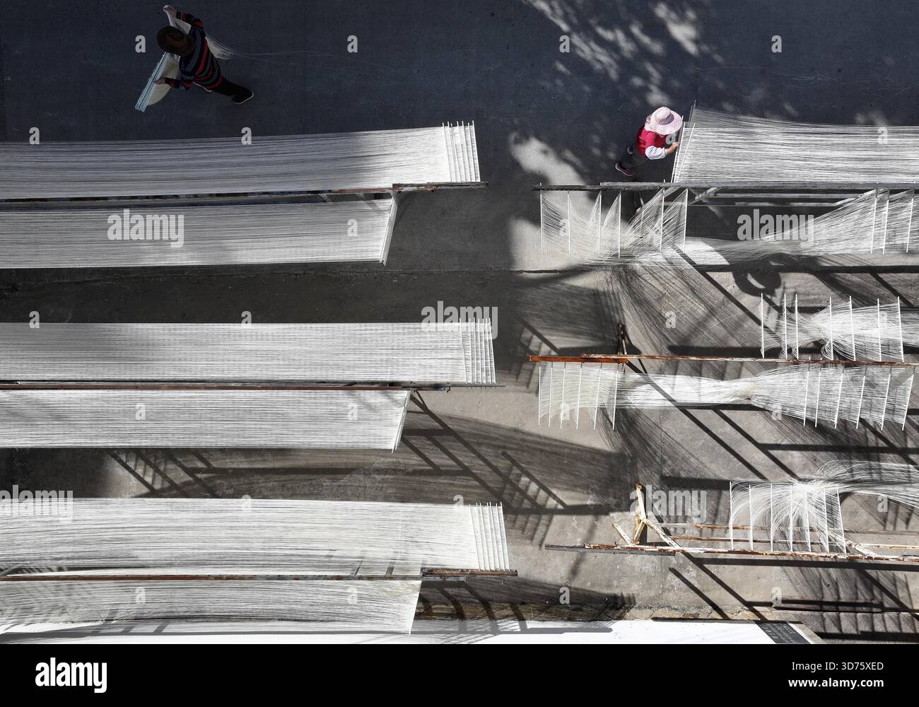 **CHINESE MAINLAND, HONG KONG, MACAU AND TAIWAN OUT** Villagers make ...