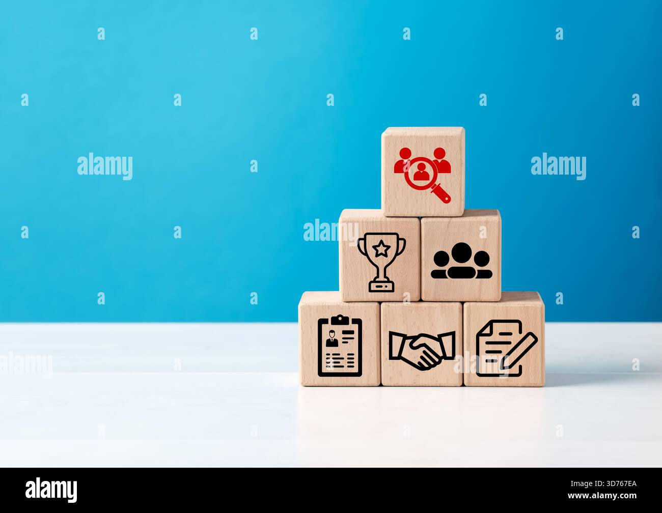 Wooden cubes with icons representing recruitment process from searching to choosing best candidate, human resources management concept Stock Photo