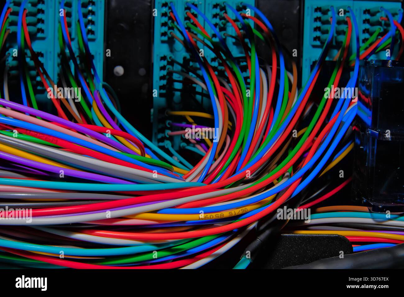 Colorful data center fiber optic and patch panel connections Stock Photo