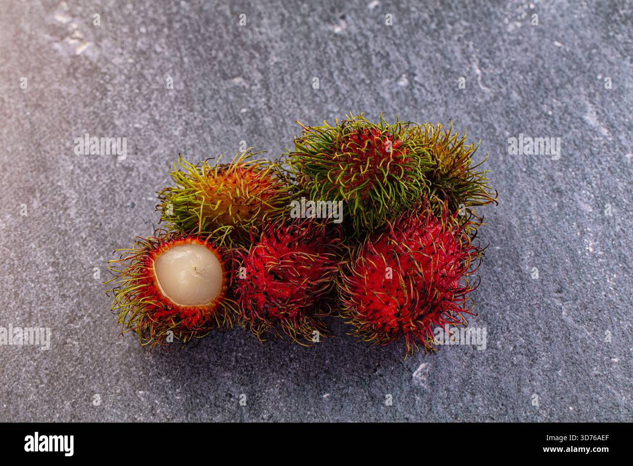 Organic tropical ripe sweet Rambutan fruit Stock Photo - Alamy