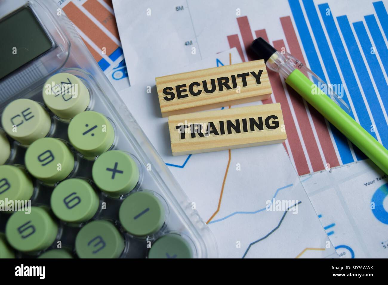 Security training text stacked wooden cubes on the table. Stock Photo