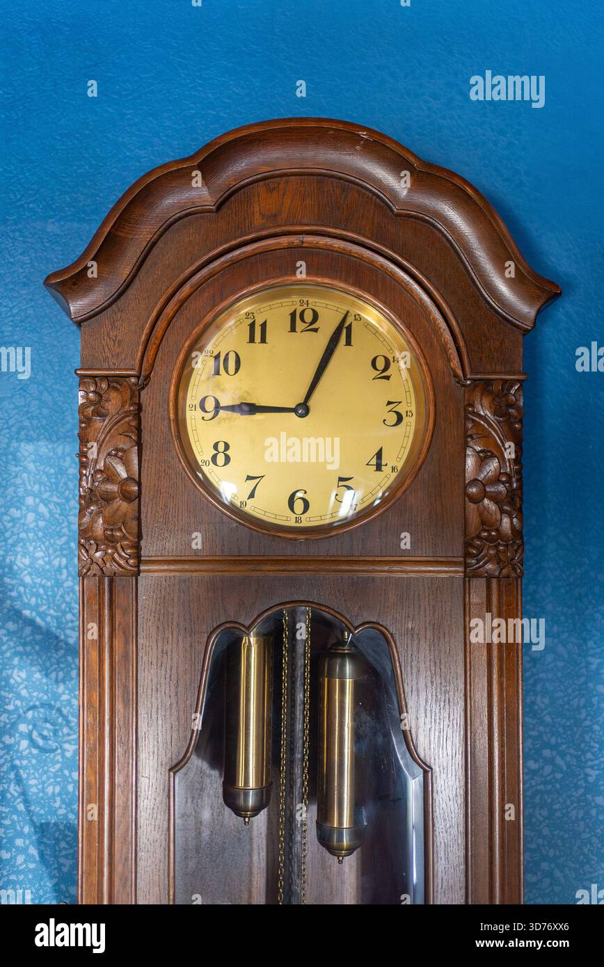 Pendulum clock wall hi-res stock photography and images - Alamy