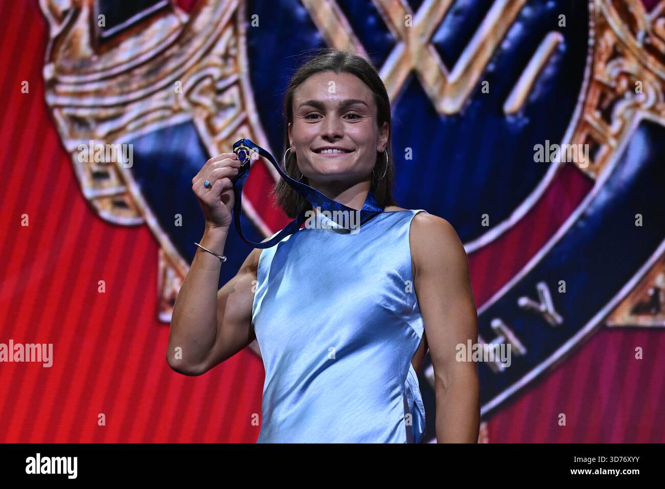 Ash Riddell of North Melbourne reacts after wining the best and fairest ...