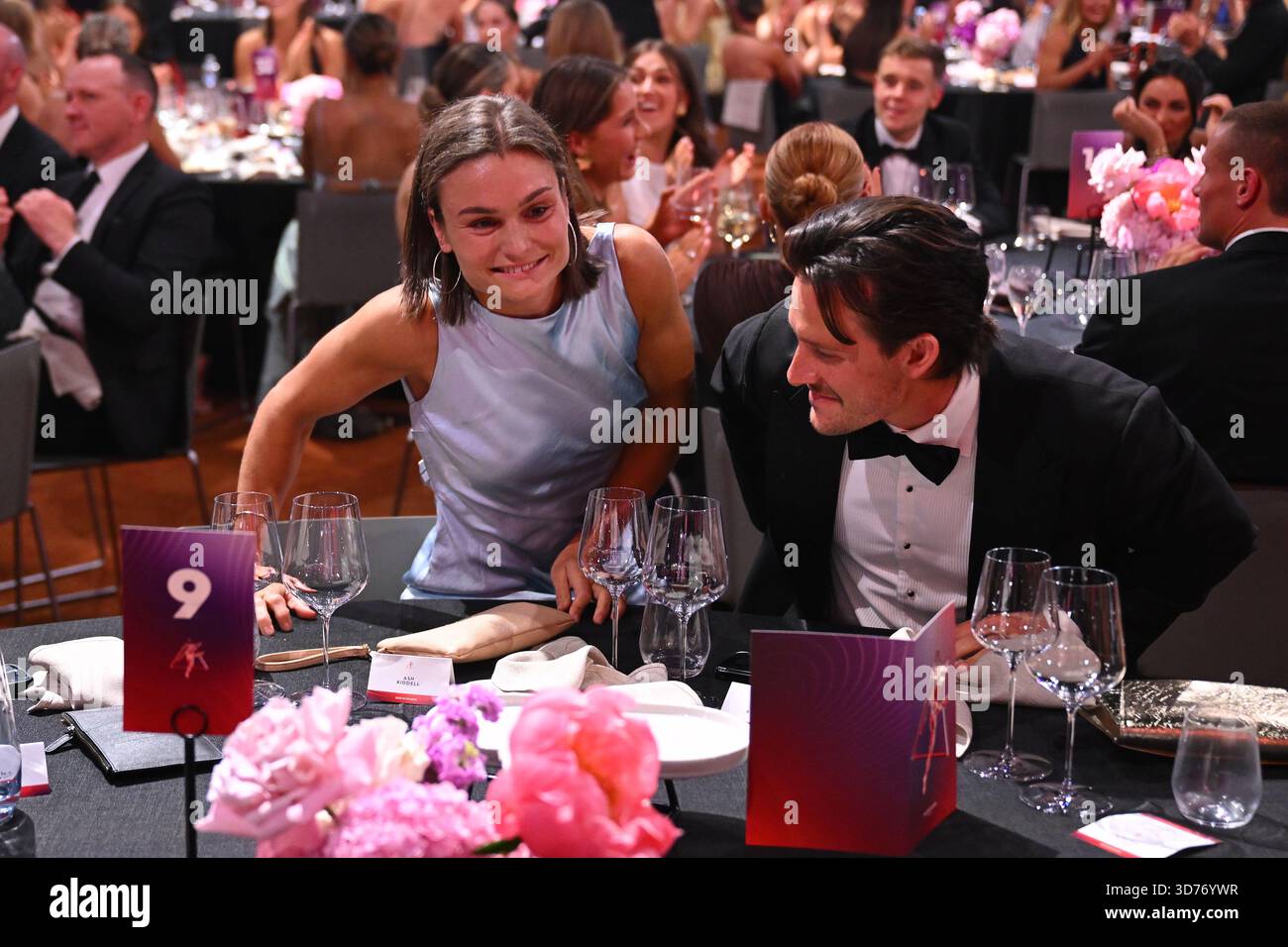 Ash Riddell of North Melbourne (left) reacts after wining the best and ...